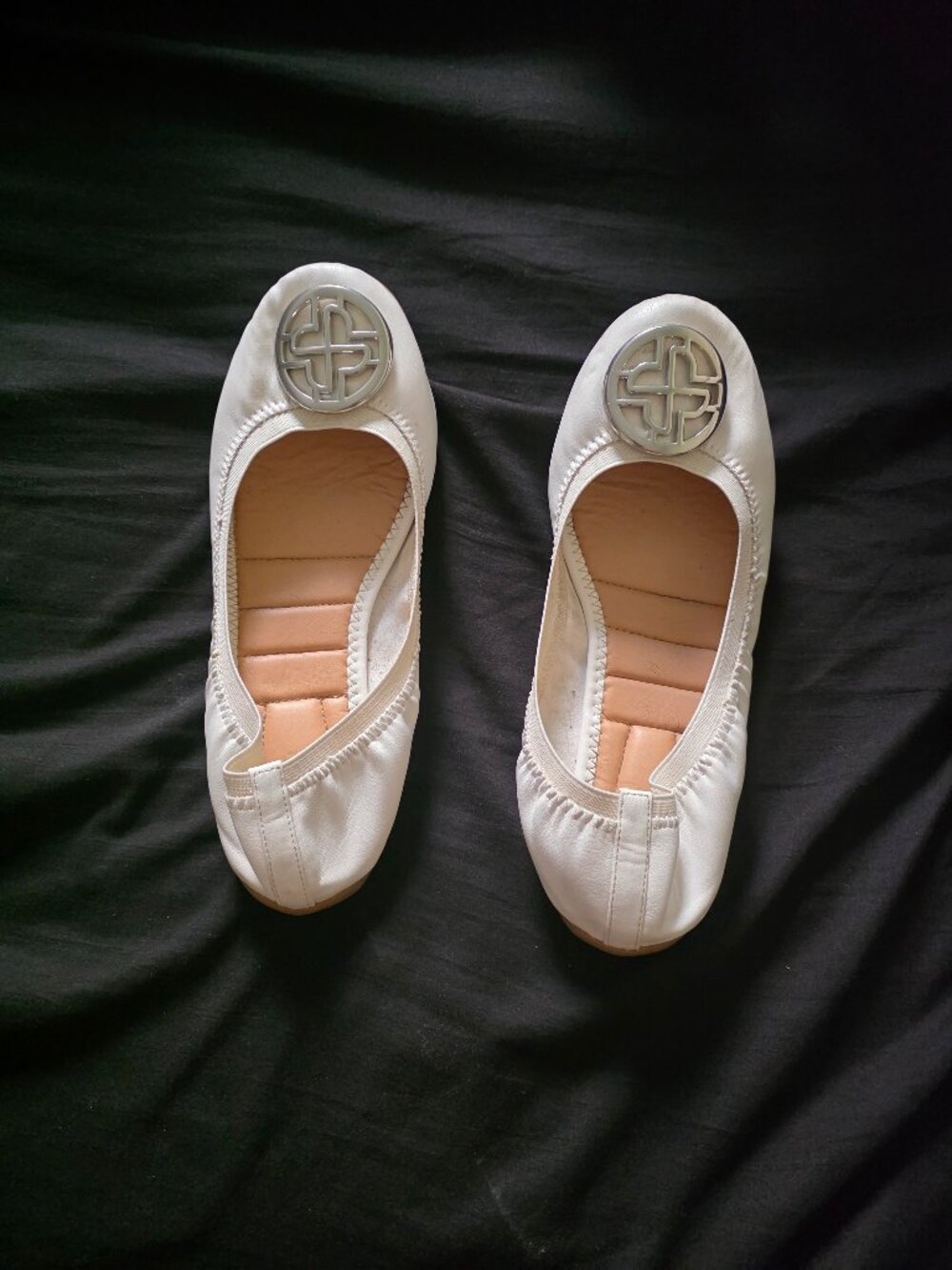 White flat shoes